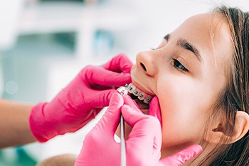 Orthodontic patient receiving professional care