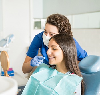 Teenager smiling in the dental chair