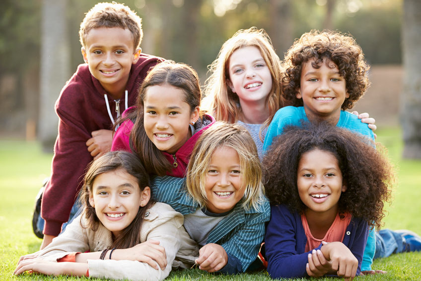 Smiling group of kids outdoors